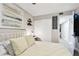 Well-lit bedroom with large bed, closet and natural light at 211 Brandy Wine Dr # 211, Largo, FL 33771