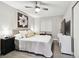 Bedroom featuring neutral colors, ceiling fan, and wood-look floors at 211 Brandy Wine Dr # 211, Largo, FL 33771