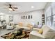 Bright living room with tile flooring, comfortable seating, and stylish decor at 211 Brandy Wine Dr # 211, Largo, FL 33771