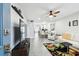 Open-concept living room with modern furnishings, tile floors, and bright, neutral decor at 211 Brandy Wine Dr # 211, Largo, FL 33771