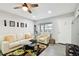Bright living room with a ceiling fan, stylish furniture, and a floral rug at 211 Brandy Wine Dr # 211, Largo, FL 33771
