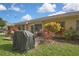 Inviting backyard patio area perfect for grilling and enjoying outdoor relaxation at 2343 Hidden Trail Dr, Spring Hill, FL 34606