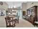 Elegant dining room with a view of the kitchen and modern decor at 2343 Hidden Trail Dr, Spring Hill, FL 34606