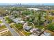 Aerial view of a home in a residential neighborhood, circled for emphasis, near a lake at 2454 15Th N Ave, St Petersburg, FL 33713