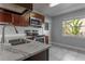 Kitchen featuring stainless steel appliances, ample countertop space and a double sink at 2454 15Th N Ave, St Petersburg, FL 33713