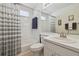 Bright bathroom with a shower and tub combination, and a large mirror at 31101 Wrencrest Dr, Wesley Chapel, FL 33543