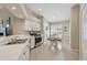 Bright kitchen with stainless steel appliances and a dining area, perfect for casual meals at 31101 Wrencrest Dr, Wesley Chapel, FL 33543
