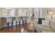 Open-concept living area with views to the kitchen and dining space, great for entertaining at 31101 Wrencrest Dr, Wesley Chapel, FL 33543