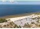 Gorgeous aerial image captures the beauty of the beach and the bay with a beautiful skyline at 3230 Mangrove Point Dr, Ruskin, FL 33570