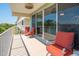 Inviting balcony with comfortable seating and plenty of shade, perfect for relaxing and enjoying the outdoors at 3230 Mangrove Point Dr, Ruskin, FL 33570