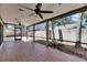 Tile floored and covered lanai providing beautiful views of the backyard at 4127 Moreland Dr, Valrico, FL 33596