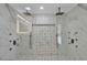 Luxurious bathroom with double rain head shower and marble accents at 4520 Pine Hollow Dr, Tampa, FL 33624