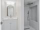 Modern bathroom featuring a vanity, a large shower with a built-in niche, and contemporary fixtures at 4520 Pine Hollow Dr, Tampa, FL 33624