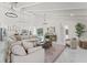 Expansive living room featuring an open layout, high ceilings, and natural light at 4520 Pine Hollow Dr, Tampa, FL 33624