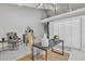 Upstairs office space with natural lighting and spiral staircase at 4520 Pine Hollow Dr, Tampa, FL 33624