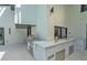 Spacious outdoor kitchen with stainless steel grill, ample counter space and sink for cooking enjoyment at 4520 Pine Hollow Dr, Tampa, FL 33624