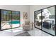 View of the pool and patio area from the main bedroom at 4520 Pine Hollow Dr, Tampa, FL 33624
