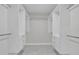 Walk-in closet featuring built-in shelving and drawers at 4520 Pine Hollow Dr, Tampa, FL 33624