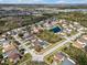 Overhead view of the residential area, lakes, and many houses at 5337 Treig Ln, Wesley Chapel, FL 33545