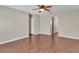 Spacious bedroom featuring hardwood floors and neutral-colored walls at 5337 Treig Ln, Wesley Chapel, FL 33545