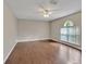 Open living room featuring hardwood floors, neutral colors, and natural light at 5337 Treig Ln, Wesley Chapel, FL 33545