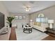 Bright living room featuring neutral colors, stylish furniture and a large window at 5337 Treig Ln, Wesley Chapel, FL 33545