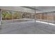 Spacious screened in patio with access to a fenced yard at 5337 Treig Ln, Wesley Chapel, FL 33545