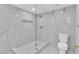 Modern bathroom featuring a glass walk-in shower at 5440 Quist Dr, Port Richey, FL 34668