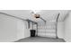 Attached garage featuring an automatic door at 5440 Quist Dr, Port Richey, FL 34668