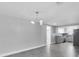 Open-concept living area flowing into an updated kitchen at 5440 Quist Dr, Port Richey, FL 34668