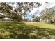 Enjoy the outdoors in the community park, with lush green lawns and playground at 5440 Quist Dr, Port Richey, FL 34668