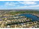 Desirable community with waterfront homes, lush landscaping, and easy access to the surrounding waterways at 5815 Dory Way, Tampa, FL 33615