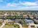 A sprawling waterfront community featuring stunning homes, private docks, and serene water views from above at 5815 Dory Way, Tampa, FL 33615