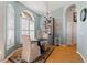 Bright dining area with a round table, elegant chairs, and large windows at 5815 Dory Way, Tampa, FL 33615