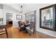 Charming dining area with natural light and decorative light fixture at 5815 Dory Way, Tampa, FL 33615