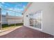 The enclosed patio has sliding doors leading indoors, offering seamless indoor-outdoor living at 5815 Dory Way, Tampa, FL 33615