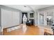 Cozy sitting area featuring a comfortable chair, lots of light, and french doors at 5815 Dory Way, Tampa, FL 33615