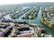 Aerial view of canal front homes and community at 6308 Newtown Cir # 8A3, Tampa, FL 33615