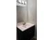 Bathroom featuring a modern vanity with a sink, mirror, and a light fixture at 6308 Newtown Cir # 8A3, Tampa, FL 33615