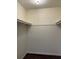 Walk-in closet with shelf for storing clothes and other items at 6308 Newtown Cir # 8A3, Tampa, FL 33615