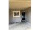 A close-up showcasing the entrance to a unit with a window on the left at 6308 Newtown Cir # 8A3, Tampa, FL 33615