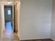 Bright hallway leading to additional rooms in the house at 6308 Newtown Cir # 8A3, Tampa, FL 33615