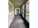 Screened in patio with access to nature views at 6308 Newtown Cir # 8A3, Tampa, FL 33615