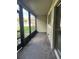 Enclosed patio featuring large glass windows offering great views and natural light at 6308 Newtown Cir # 8A3, Tampa, FL 33615