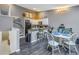 Cozy dining area adjacent to the kitchen, featuring a breakfast bar and open floor plan at 6311 93Rd N Ter # 4403, Pinellas Park, FL 33782