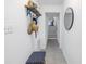 Entryway with bench and stairs leading up at 6311 93Rd N Ter # 4403, Pinellas Park, FL 33782