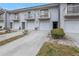 Exterior of townhomes with driveways and attached garages at 6311 93Rd N Ter # 4403, Pinellas Park, FL 33782