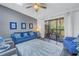 Comfortable living room with access to a screened lanai, perfect for relaxing and entertaining at 6311 93Rd N Ter # 4403, Pinellas Park, FL 33782