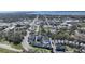 Aerial view showcasing community living among lush greenery, connecting to the main street and ocean views at 637 Jetstar Ln, Oldsmar, FL 34677