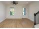 Spacious living area with hardwood floors, plenty of natural light, and modern fixtures at 637 Jetstar Ln, Oldsmar, FL 34677